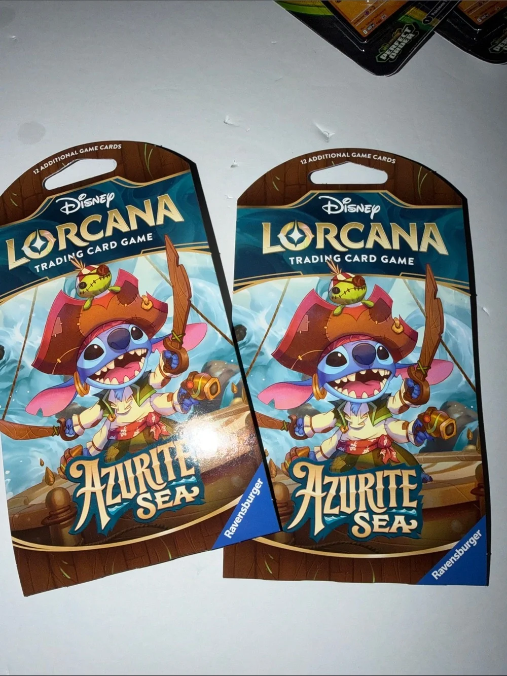 Disney Lorcana Azurite Sea Trading Card Pack – Blue & Brown Art